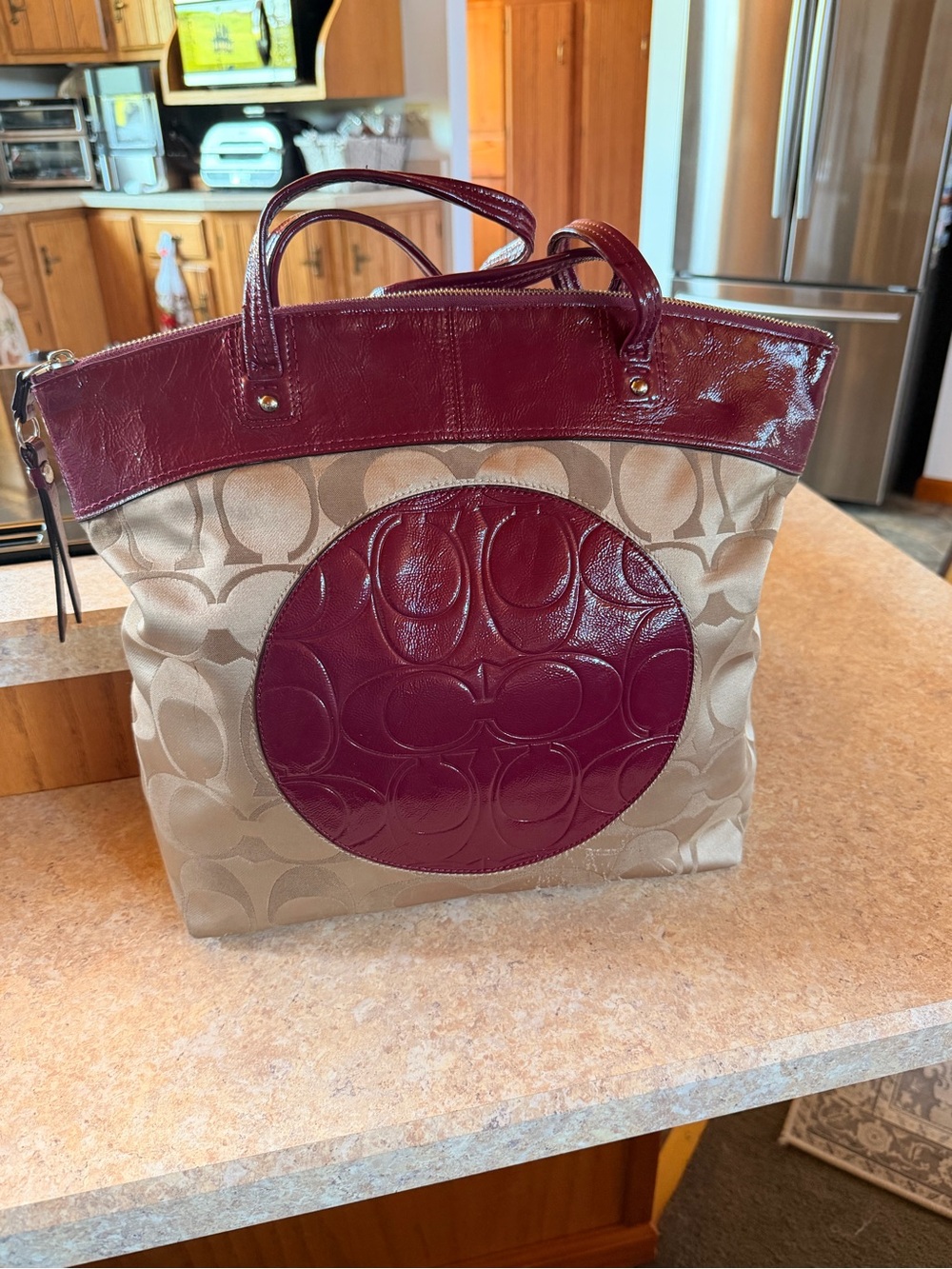 Coach Beige Signature Canvas Tote with Burgundy Leather Accents